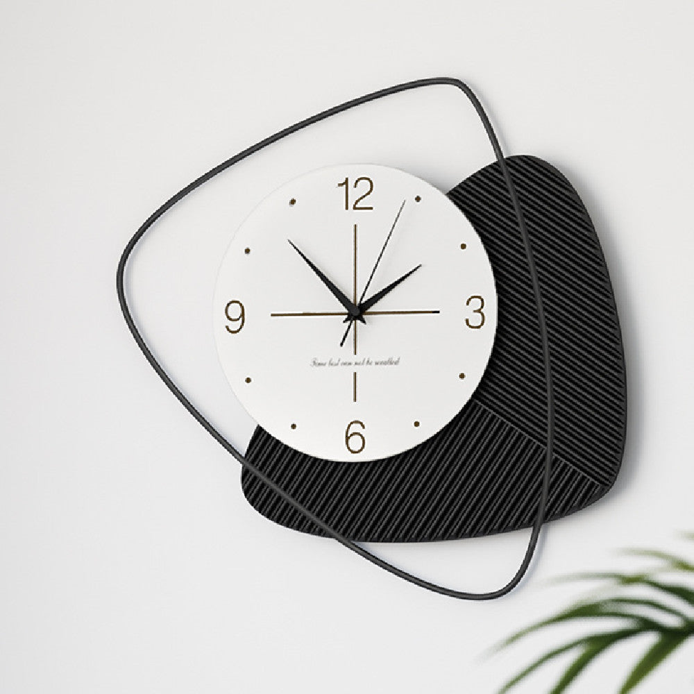 Modern wall clock with a white dial, black ribbed panel and thin black metal frame