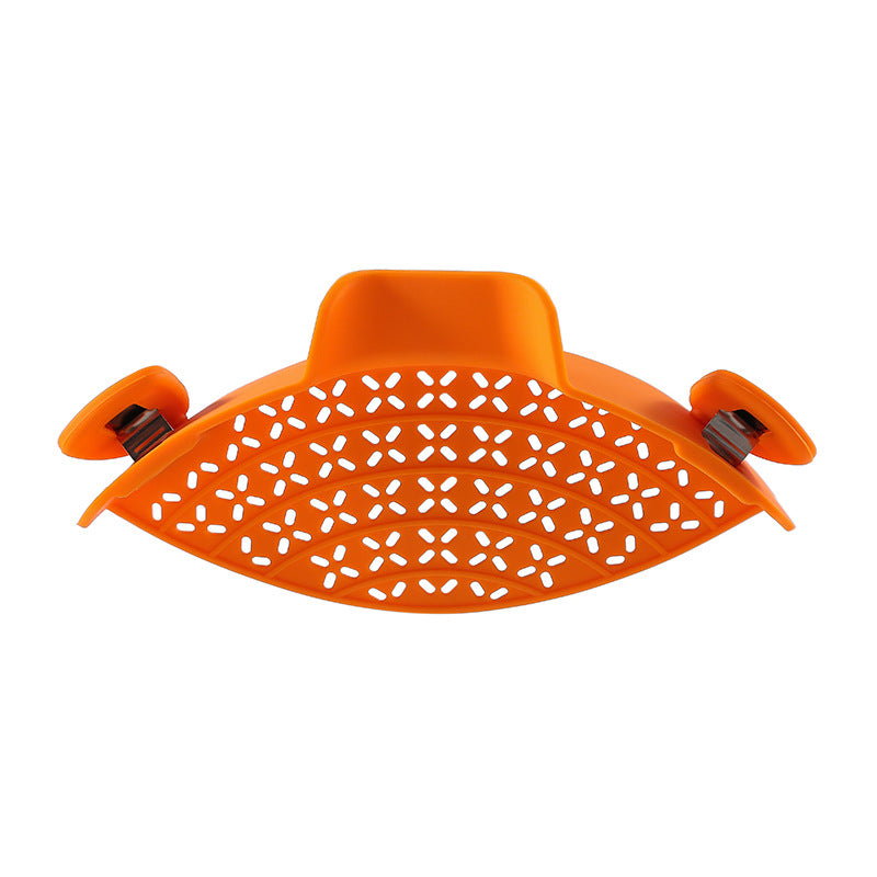 Orange clip-on silicone pot strainer