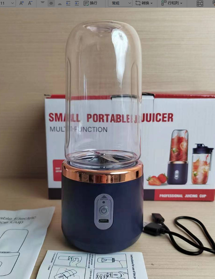 Navy portable blender in front of its retail box with USB cable