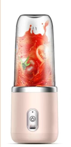 Pink portable blender with a clear jar